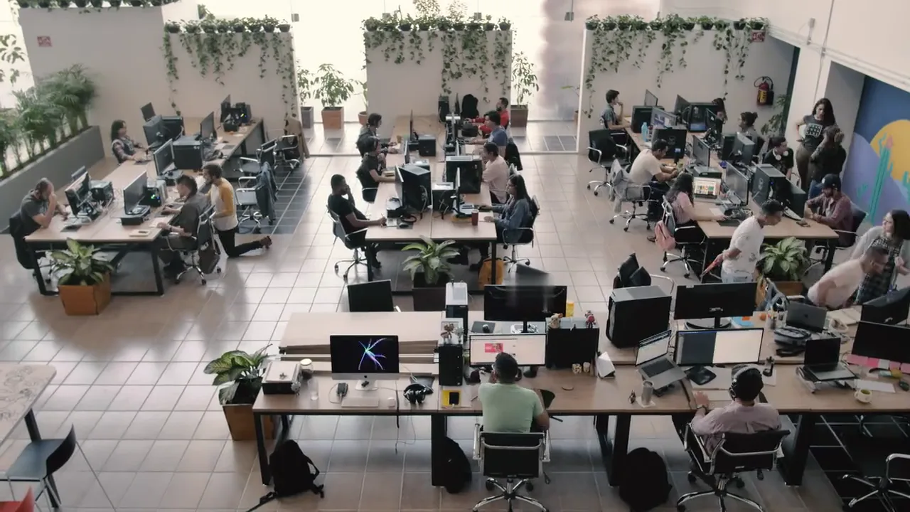 A professional team coordinating customer work in a modern office